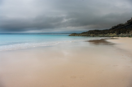 Perfect sand, turquoise sea and steel grey sky in St. Ives